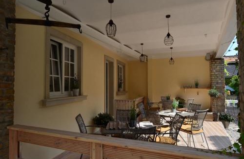 Weisenheim am Sand House | Gästehaus & Weingut GEHRIG