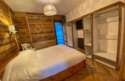 Les Sagnieres Apartment | Gîte avec jacuzzi privatif