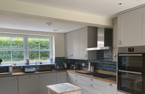 Lochgair Cottage | Gallanach Cottage lochside setting with a large enclosed garden