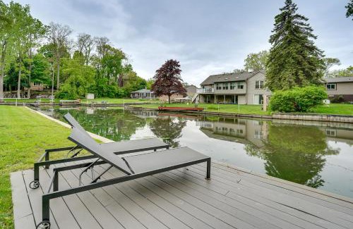 Commerce Township House | Game Room and Fire Pit Canal-Front Commerce Home