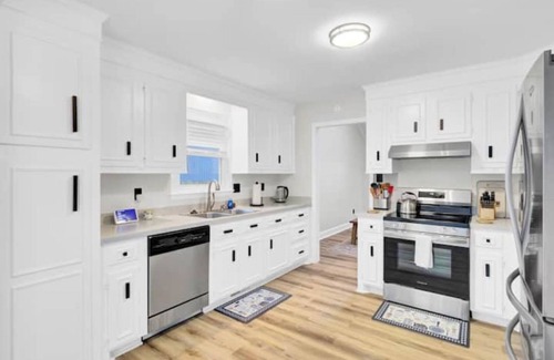 North Charleston House | Game Room Fireplace Backyard Deck Fire Pit Pets