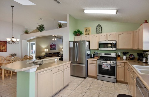 Windsor Palms House | Game room, pool & hot tub, full privacy in pool area, TV in each bedroom