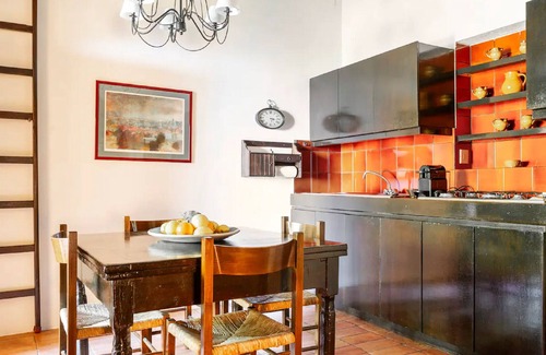 Castagneto Carducci Apartment | Garden Apartment with Sea view - hilltop Medieval village, 10' from the Beach.
