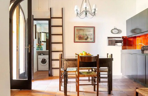 Castagneto Carducci Apartment | Garden Apartment with Sea view - hilltop Medieval village, 10' from the Beach.