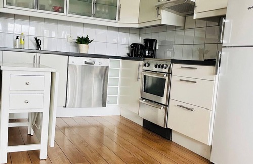 Oygarden Condo | Garden apartment by the sea, close to beach