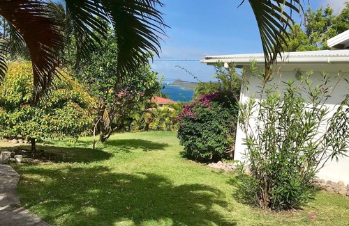 St. Patrick House | Garden Cottage with sweeping lawn view to the Caribbean Sea and islands