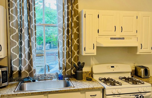 Faubourg Livaudais Apartment | Garden District Victorian off historic St. Charles Ave.