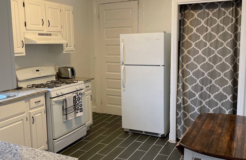Faubourg Livaudais Apartment | Garden District Victorian off historic St. Charles Ave.