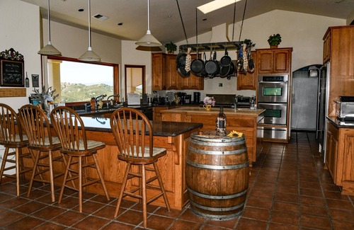 Soledad House | Gated Mediterranean villa surrounded by vineyards near Pinnacles National Park.