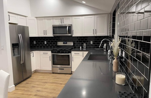 Van Nuys House | Gated private home with own parking Sherman Oaks-Minutes from Universal Studios!
