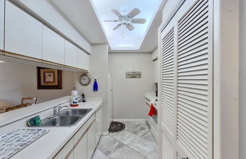 Bonita Bay Condo | Gated resort community condo with water views, pool, hot tub, & balcony