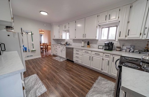 Price House | Gather here! Hot Tub, Huge Kitchen, Fireplace, & BBQ! Walk to Downtown Price!