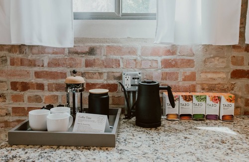 West Lakeview Condo | Gather Together & WFH in Piece of Chicago History