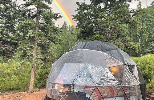 Lake George RV Rental | Gaze at the stars from your bed in a unique dome!