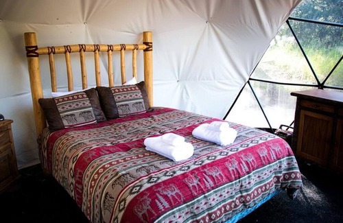 Lake George RV Rental | Gaze at the stars from your bed in a unique dome!