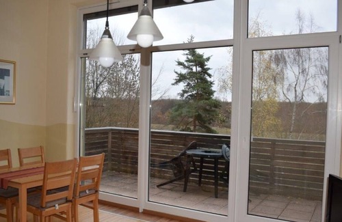 Bergrheinfeld Apartment | Gemütliche Ferienwohung (49qm) mit Balkon und Ausblick über Mainufer