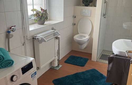Niederlauch Apartment | Gemütliche Ferienwohnung mit Wintergarten und Terrasse für Ruhige Urlaub