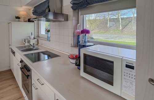 Wangerland Apartment | Gemütliche Ferienwohnung Sommerhaus für 2 Personen - 39 qm Pure Erholung