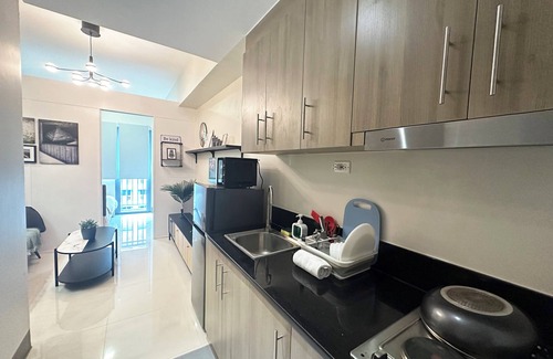 Highway Hills Condo | GemstoneBR in SMDC Fame Residences