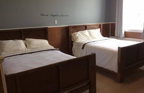 St. Barbe Hotel | Genevieve Bay Inn