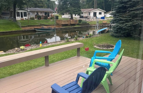 St. Helen Cottage | Get away and relax in this Cheerful Waterfront Cottage! Pontoon Included!