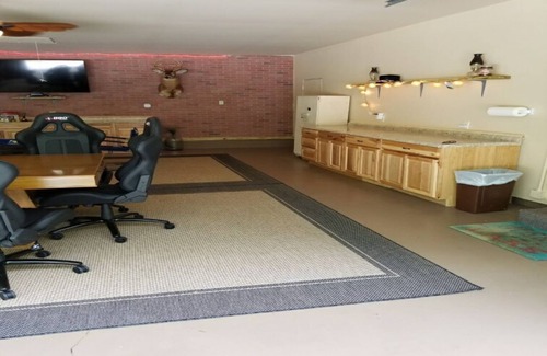 Higgins Lake House | Get away to this beautiful open concept house within walking distance to Higgins