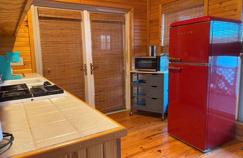 Pleasant Grove Cabin | Get some peace inside and out at this cozy cabin-warm fire, river, and fishing!
