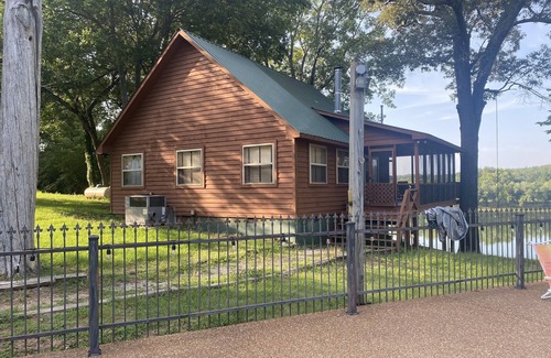Pleasant Grove Cabin | Get some peace inside and out at this cozy cabin-warm fire, river, and fishing!