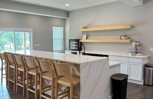 Grove House | Giant 10-bedroom lakefront home with large pool, hot tub, and dock