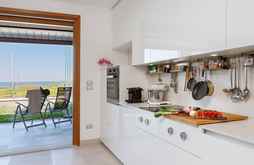 Portopiccolo Apartment | Giardino vista castello - Portopiccolo Apartments