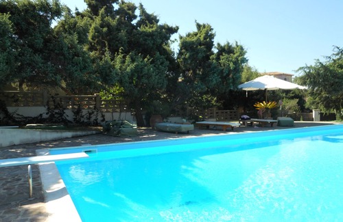 Calasetta Villa | Ginepri e Lantane