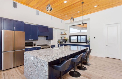 Concan House | Glam Luxury Home by Frio River! Heated Infinity Pool Firepit Huge Hot Tub Views