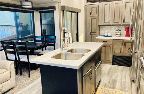 Ariel House | Glamping at Coyote Ridge! Camp out in style in a luxury cottage RV! W/firepit