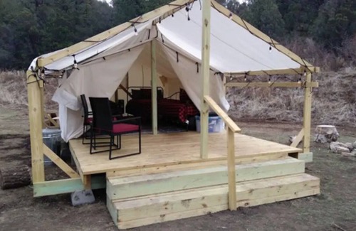Mayhill RV Rental | Glamping Wall Tent in a Cozy Forest Setting at Camp Rio