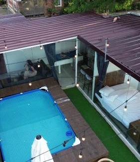 CSJDM House | Glass Cabin Secluded Overlooking Oasis with pool