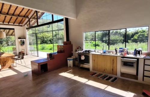 Catucaba House | Glass house surrounded by nature