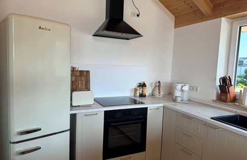 Worthsee Apartment | ღLIBORIA Idyllic roof terrace apartment with a view of Lake Wörth