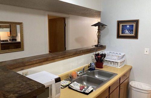 Red River Condo | Golden Nugget - cozy 2 bedroom condo wood fireplace -free wifi - fully equipped
