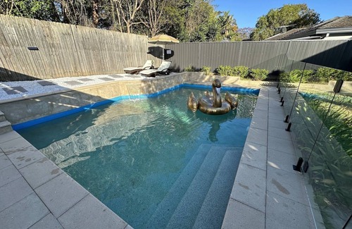 Marsfield House | Golden Swan Pool and Spa Smart Home with game room