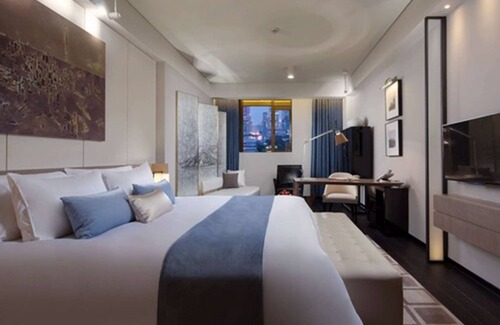 Haining Road Hotel | Golden Tulip New Asia Hotel, The Bund Shanghai