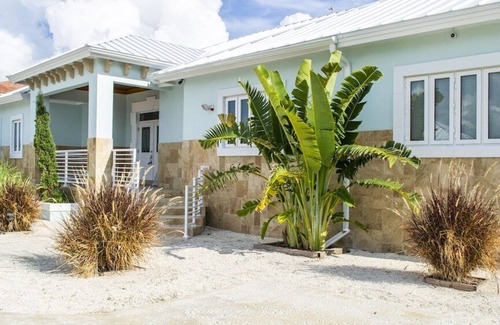 Bahamas Terrace House | GoldenEye- Beach Villa With Dock