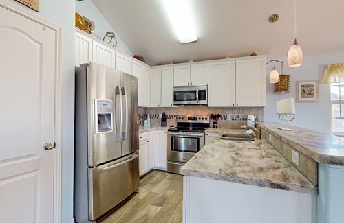 Leeward Sands House | Golf Cart Access, Pet Friendly, Parking for 4