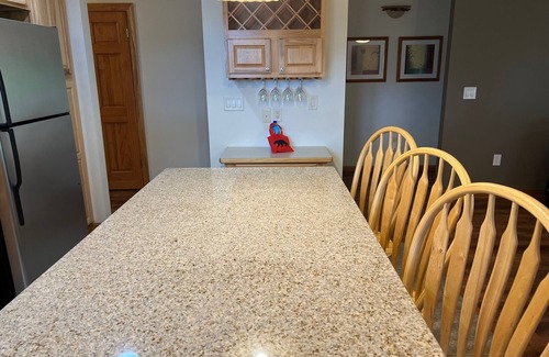 Arkdale Condo | Golf Cart available! Gorgeous Golf & Lake Condo with heated pool