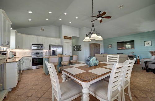 Leeward Sands House | Golf Cart friendly Coastal Oasis! Spacious, Near Beach, Fishing, Shops & Pool!