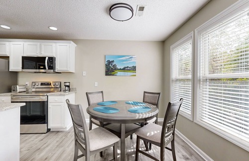 St. James Condo | Golf course view home with patio, close to ocean and beach access