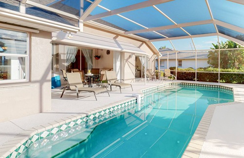 Long Meadow House | Golf course-view retreat with a private, heated pool, lanai, AC, & washer/dryer