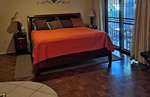 Sun City West House | Golf course view home with a private backyard oasis