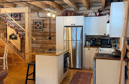 Thompsonville Cabin | Golf,fish,hike,kayak,ski,relax! Private 10 acres right on the Betsie River