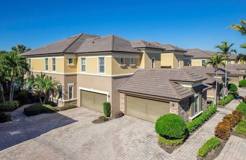 Naples House | Golf/Lake View 2 Bed+Den Coach Home In Amenity Rich Community, the Quarry!