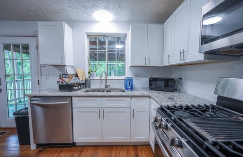 Stone Mountain House | Gorgeous 4-Bed Home Sleeps 20, Near Airport & Downtown!